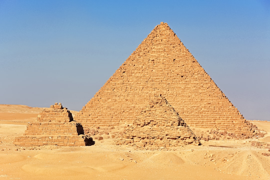 brown pyramid under blue sky during daytime