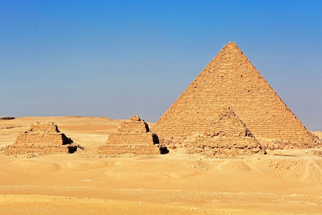 pyramid on desert during daytime