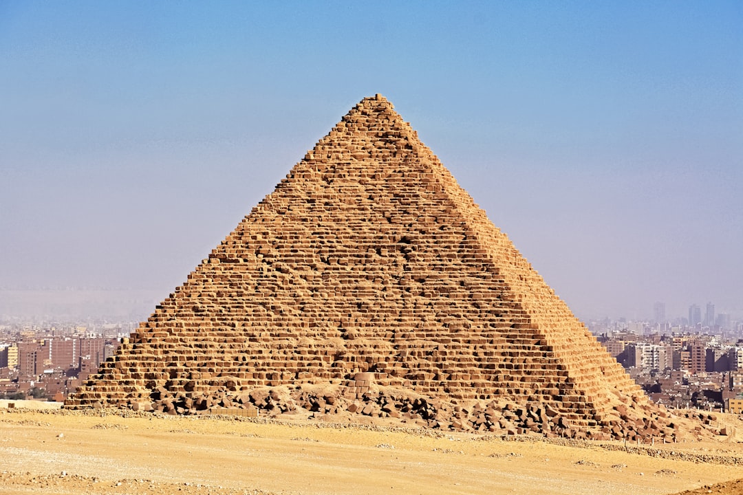 pyramid on desert during daytime