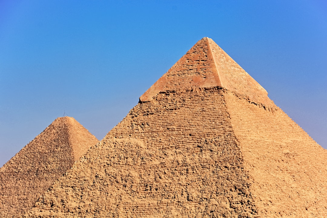 brown pyramid under blue sky during daytime
