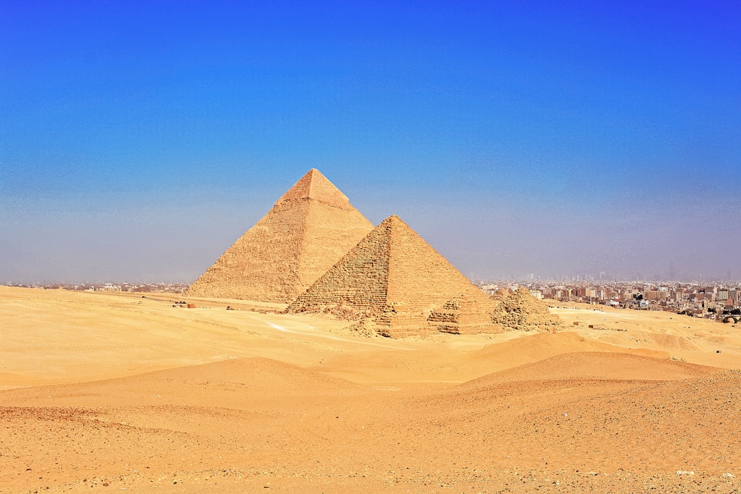 brown pyramid under blue sky during daytime