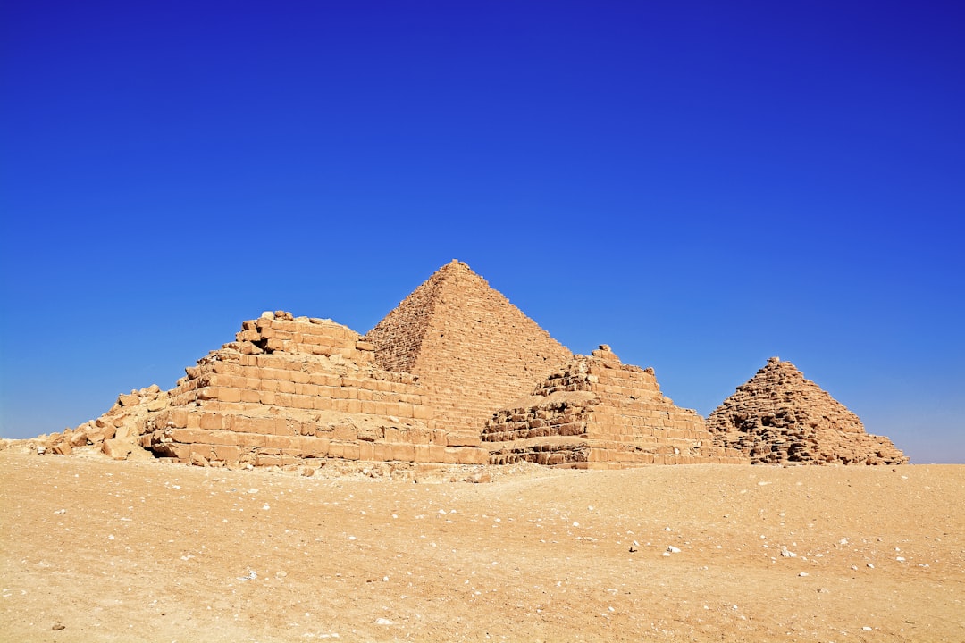 brown rock formation under blue sky during daytime