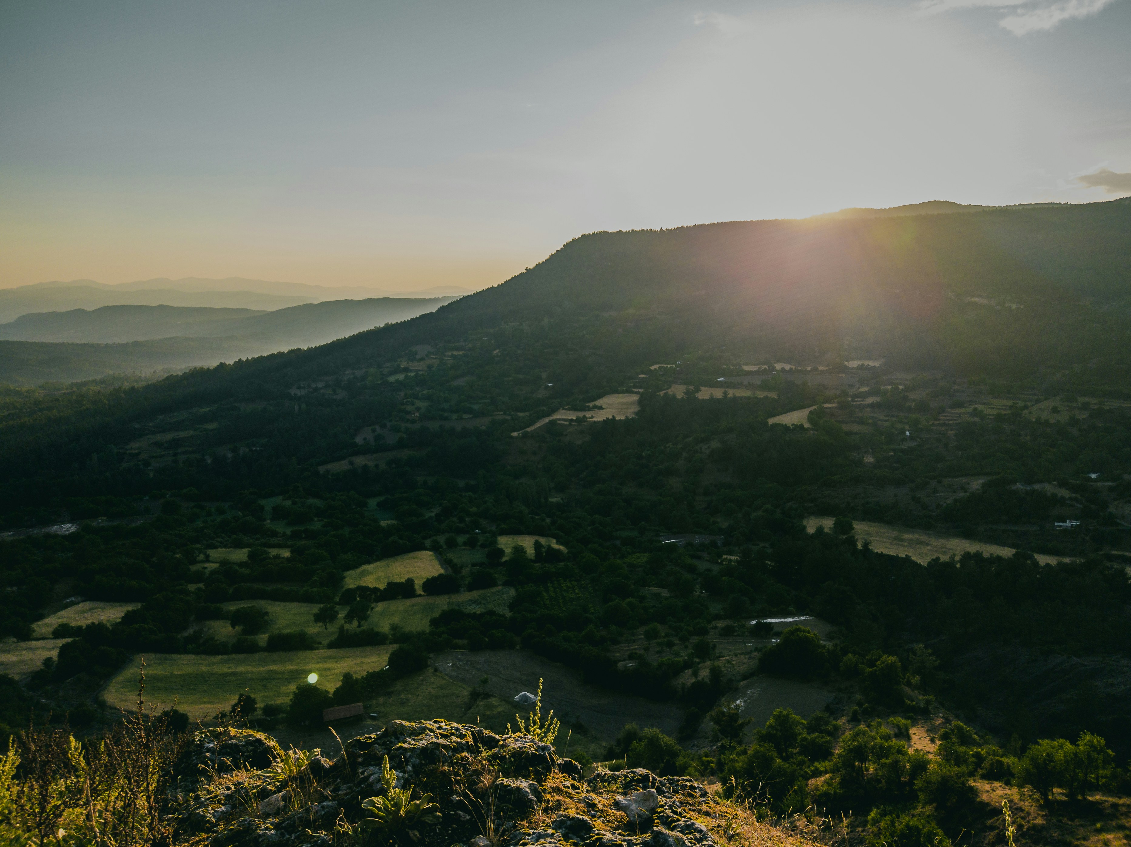 green mountain under white sky during daytime