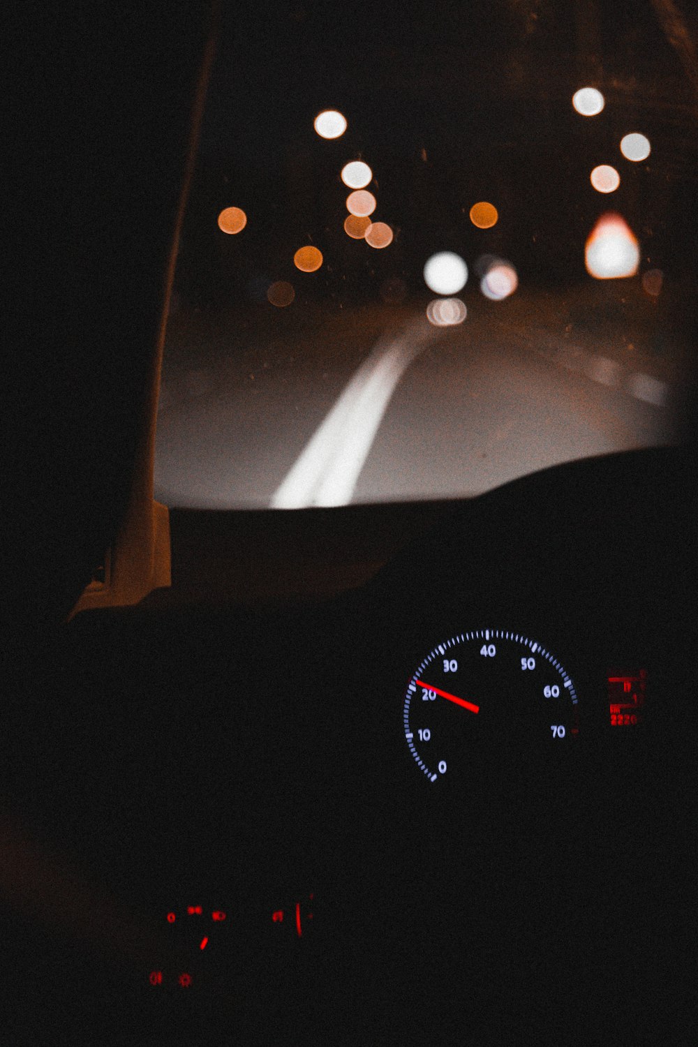 black and white analog speedometer