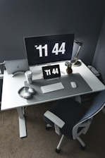 silver imac on white table
