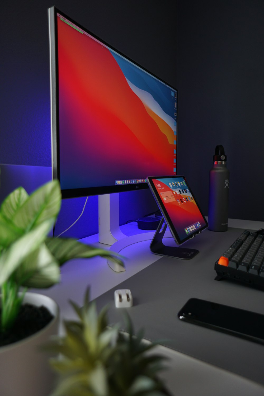 black flat screen computer monitor beside black computer keyboard