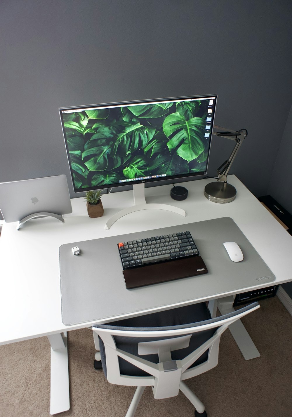 silver imac on white table