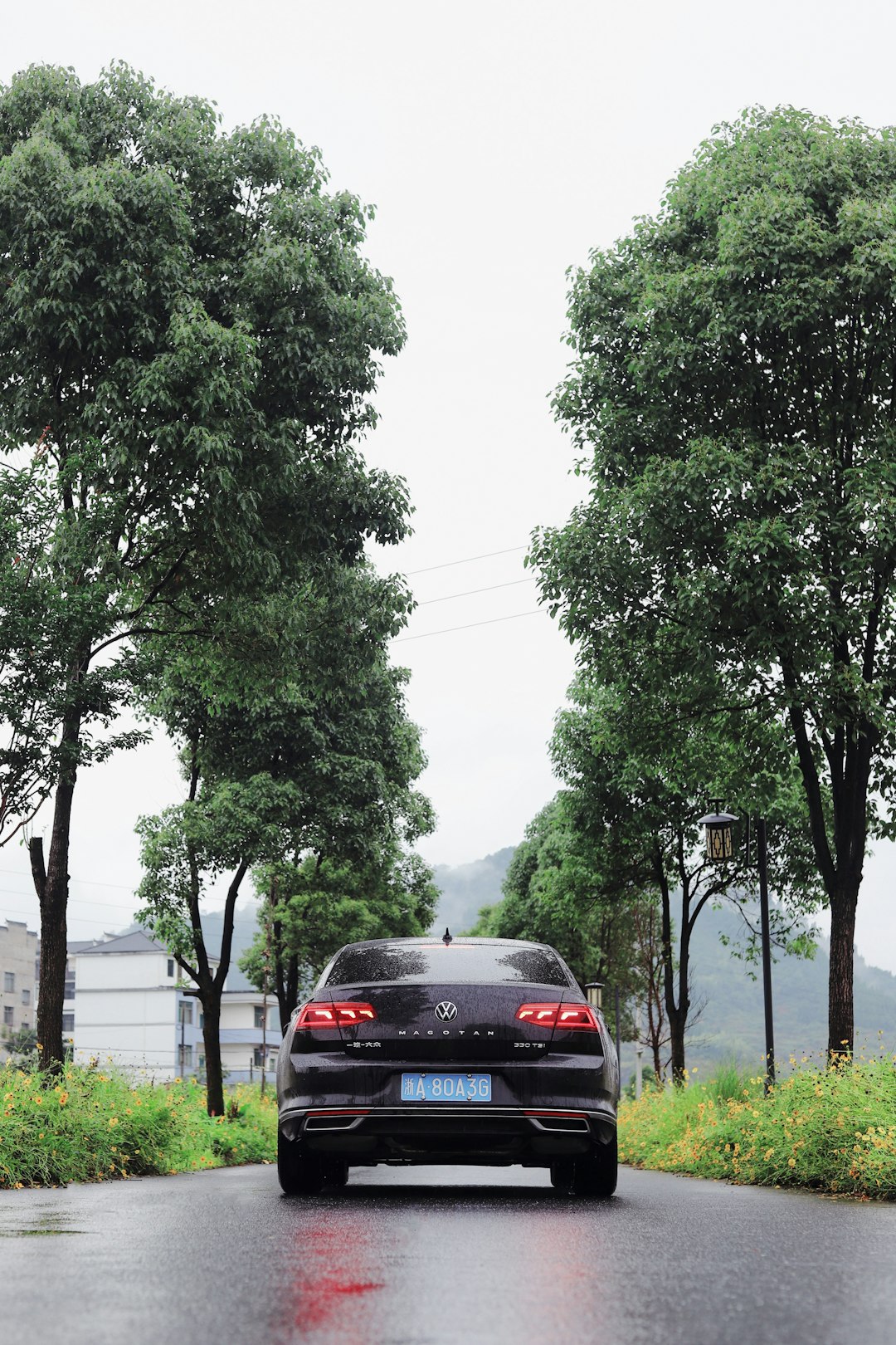 black car on road during daytime