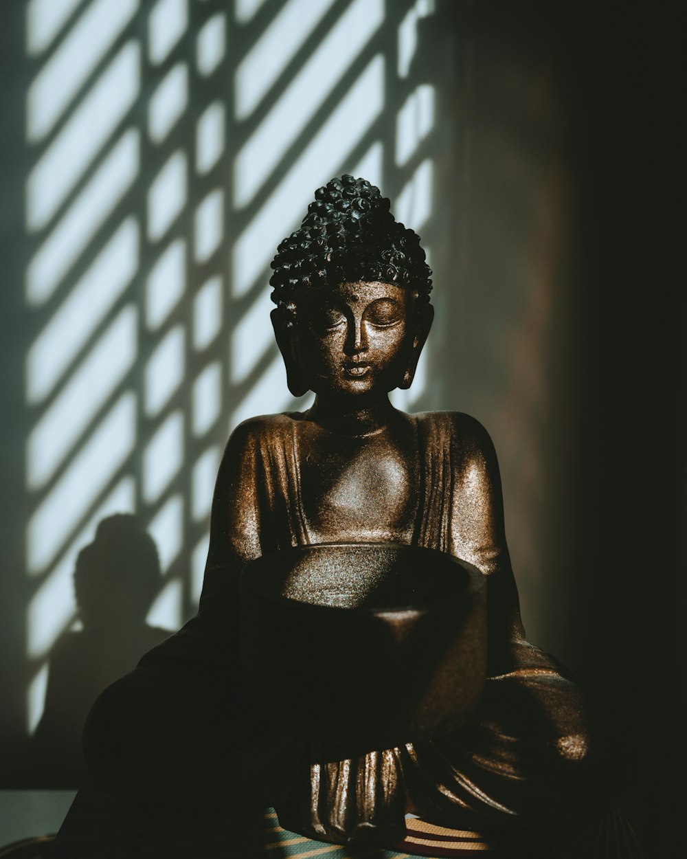 woman in black dress sitting on chair