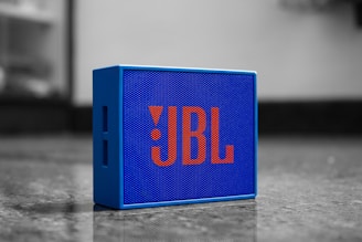 blue and black digital clock at 10 00