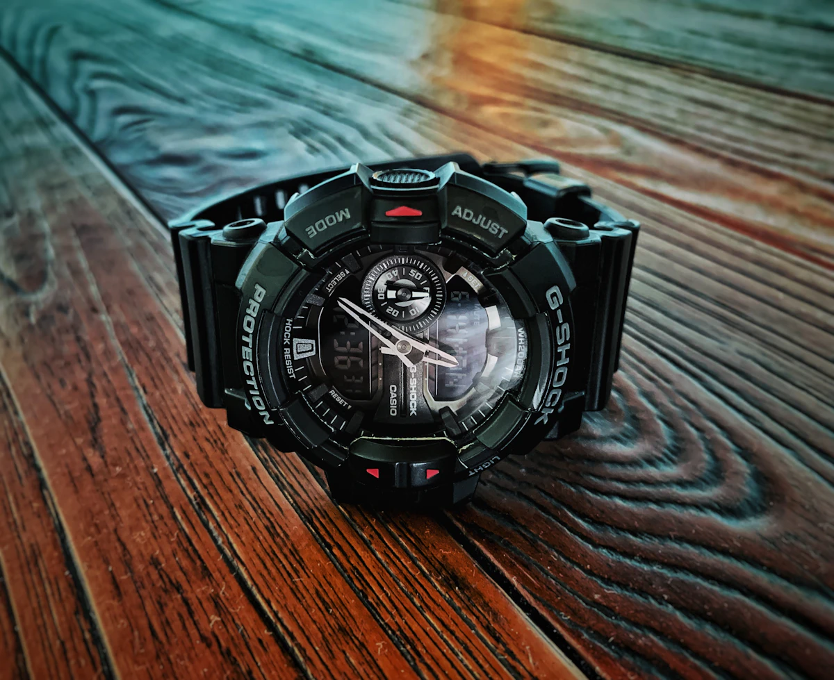 Black G-Shock digital analog watch with carbon core guard structure