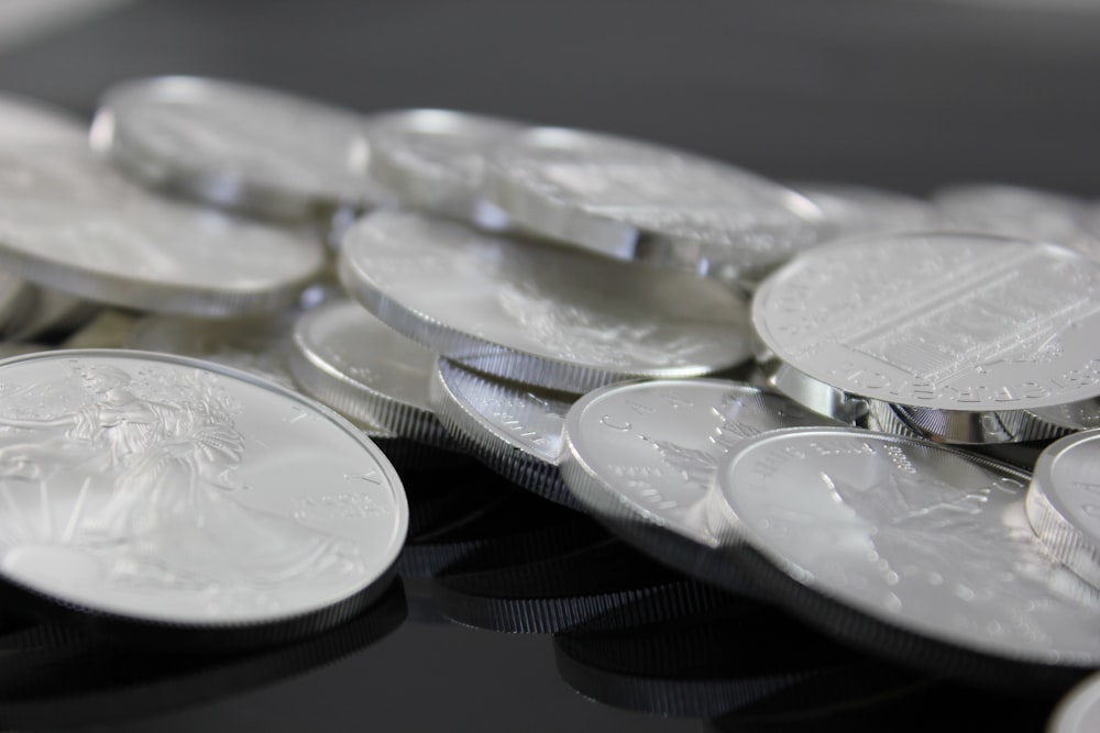 clear glass round plate on black textile