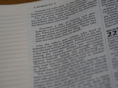 A close-up of a page from a book, featuring text printed in black on a white background. The text is arranged in paragraphs with numbered sections and some quotations. The left margin is visible, with dotted lines on the page.