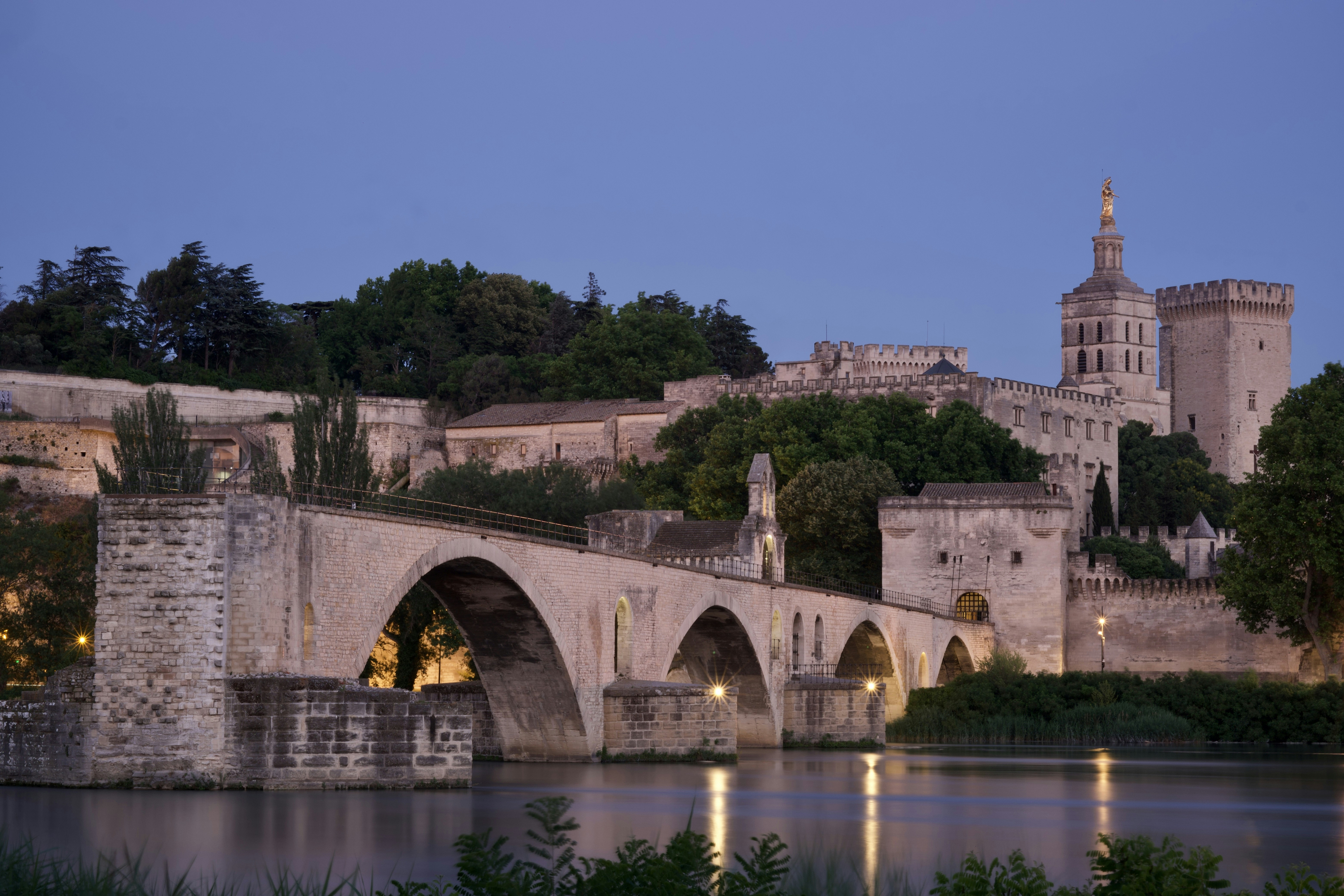 gray concrete bridge over river