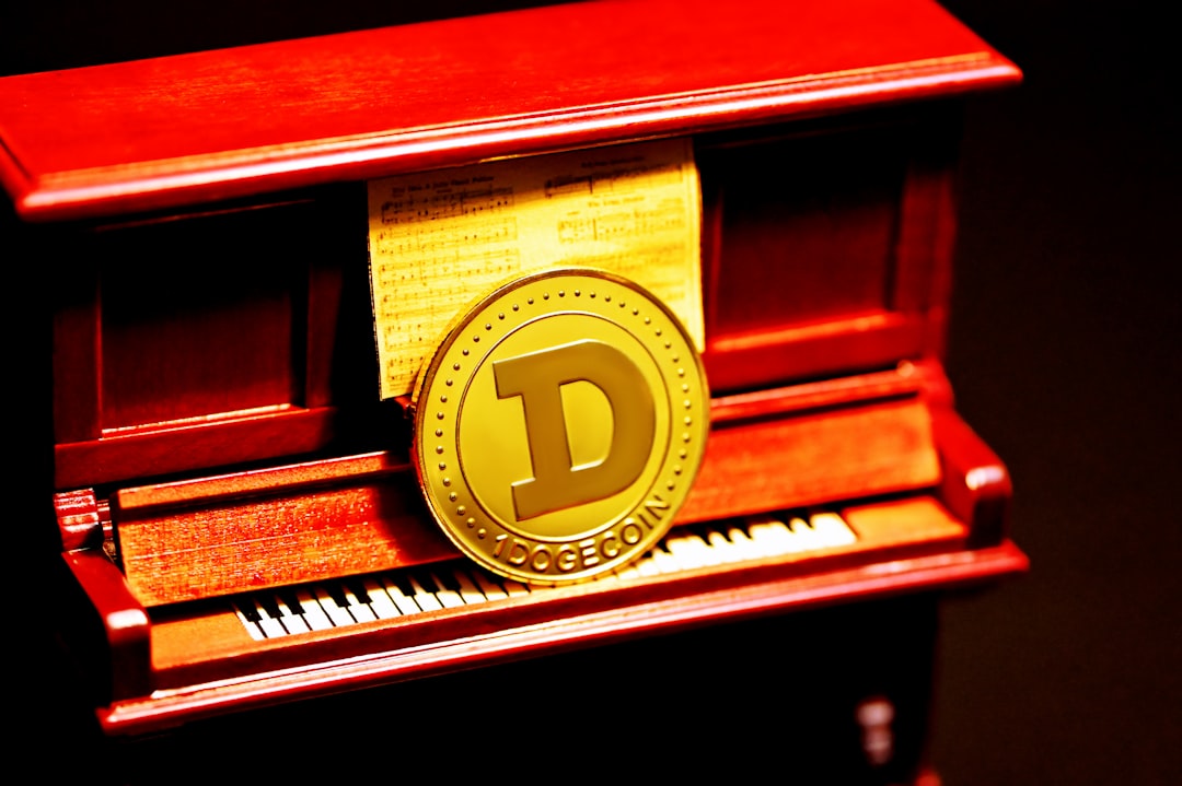 A Dogecoin on a miniature upright piano.