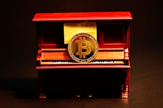 red and black piano with analog clock