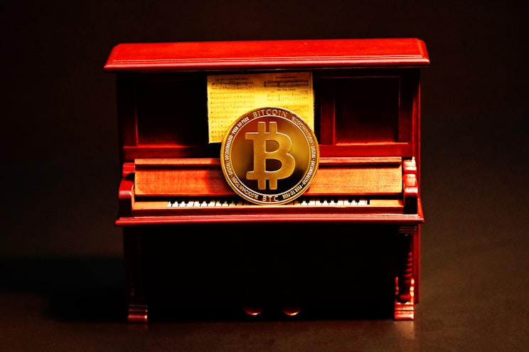 red and black piano with analog clock