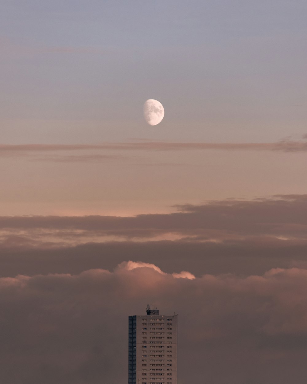full moon over city skyline