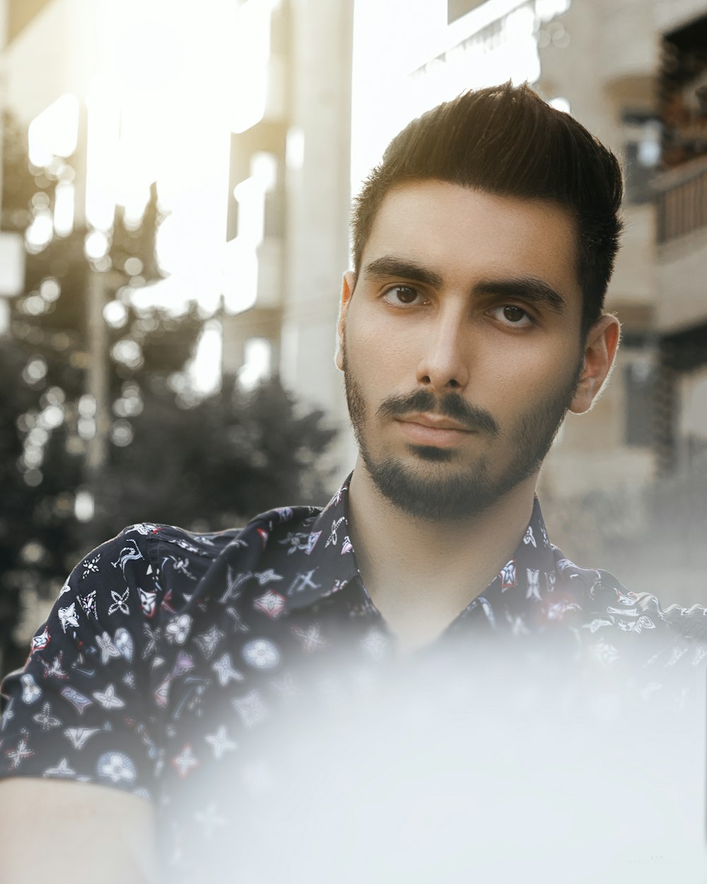 man in black and white button up shirt