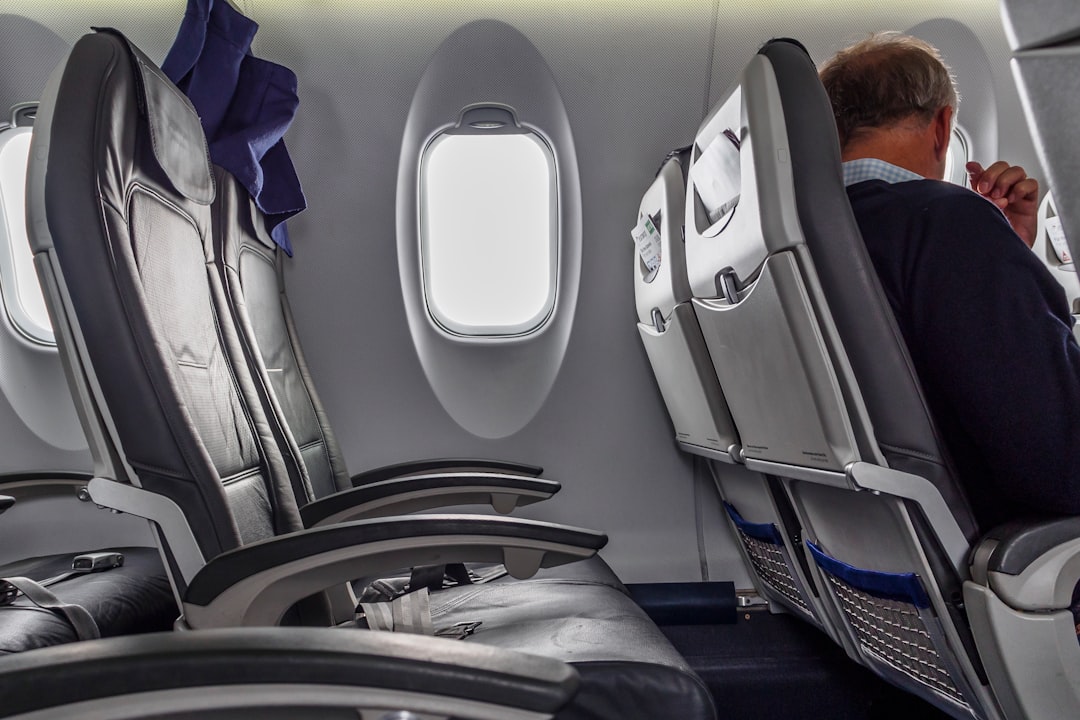 Crammed In Coach: 4 Clever Hacks to Survive Long Flights in Economy Class
