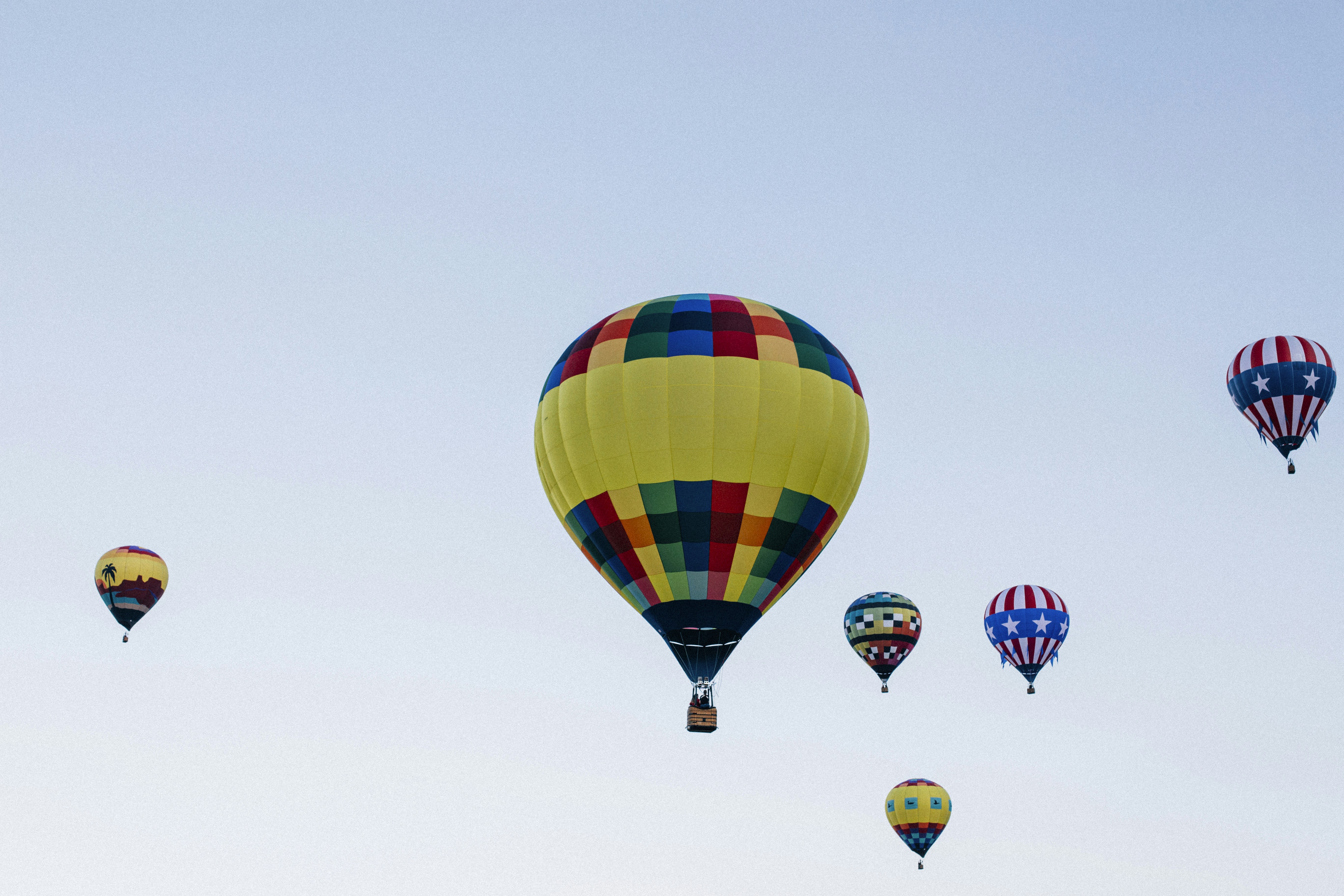 Yellow, green, and red hot air balloon