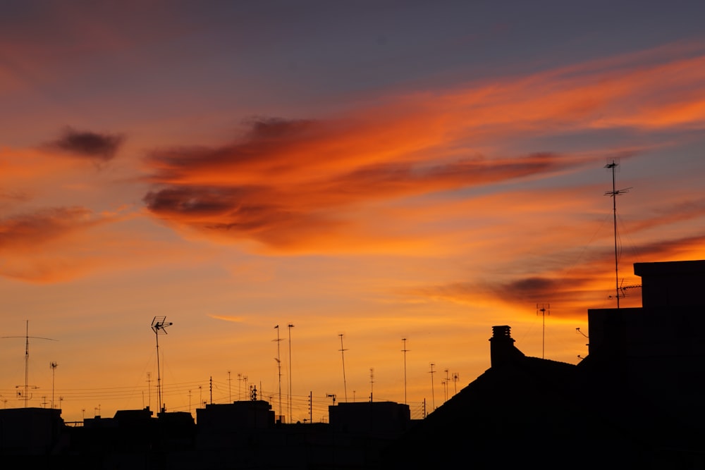 silhouette of building during sunset