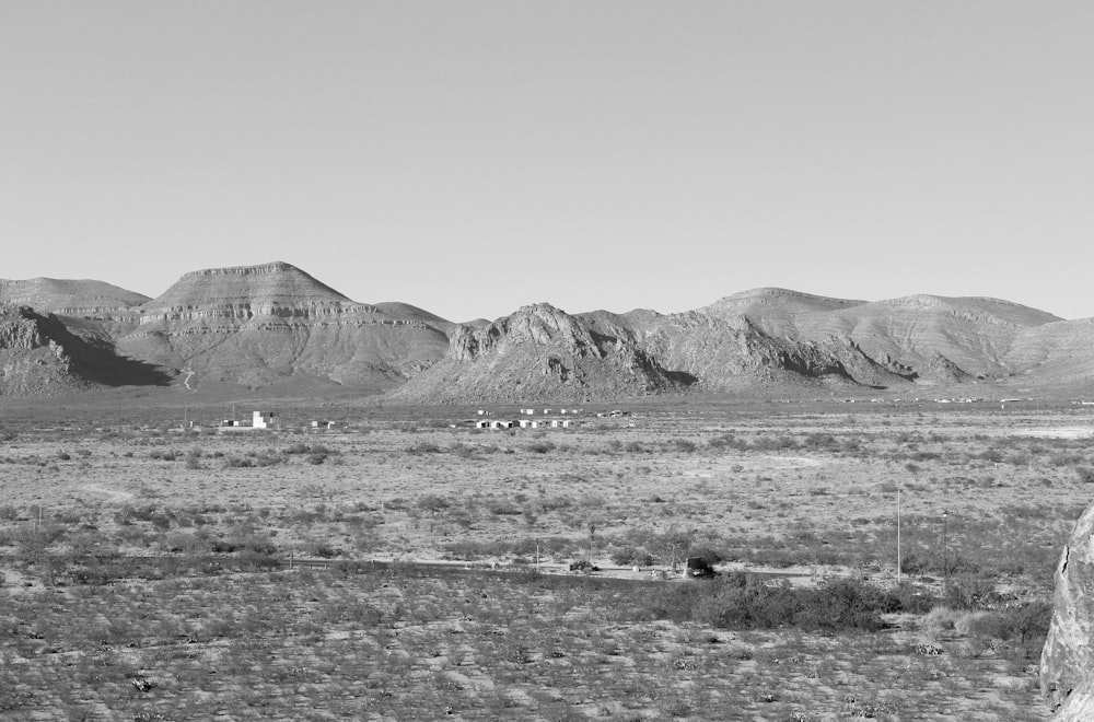 grayscale photo of mountain range