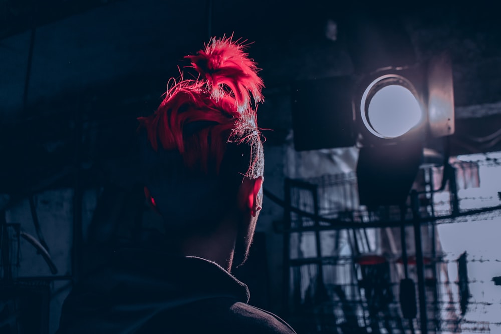 red and white smoke on persons hand