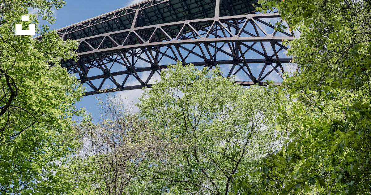 George Frame Bridge Black metal frame bridge under blue sky during daytime photo – Free New ...