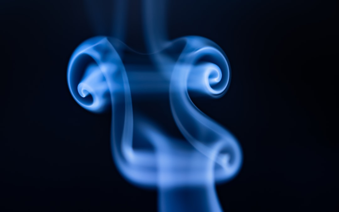 white smoke on black background