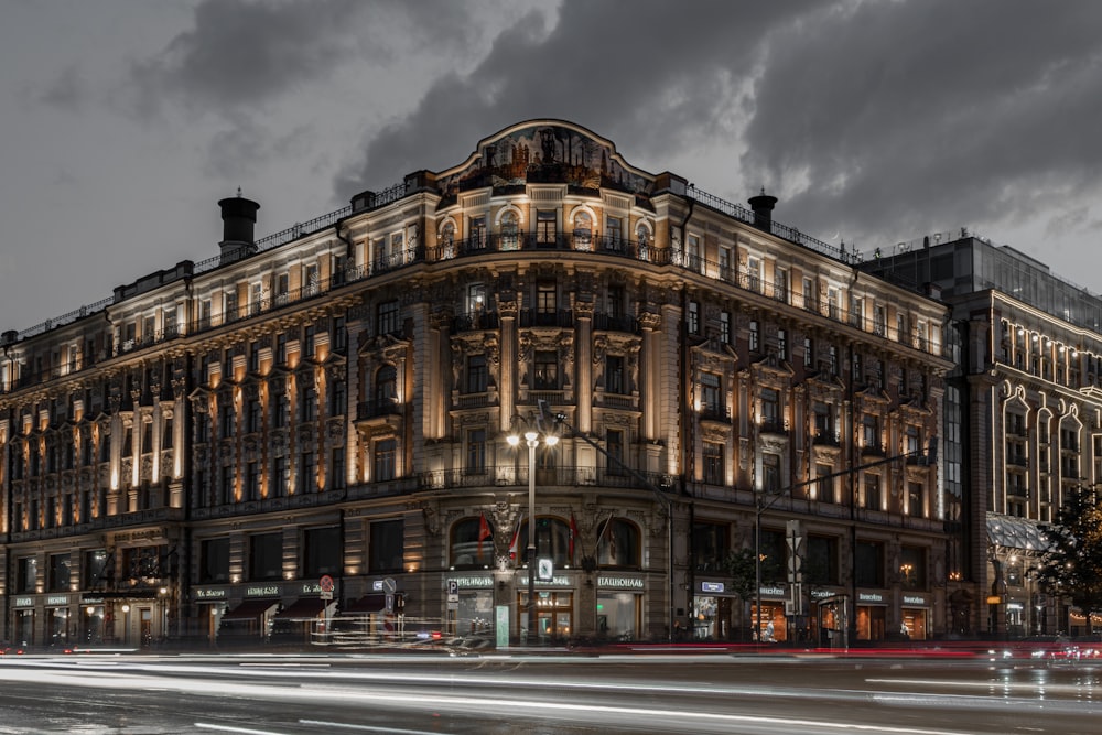 brown concrete building under cloudy sky during daytime