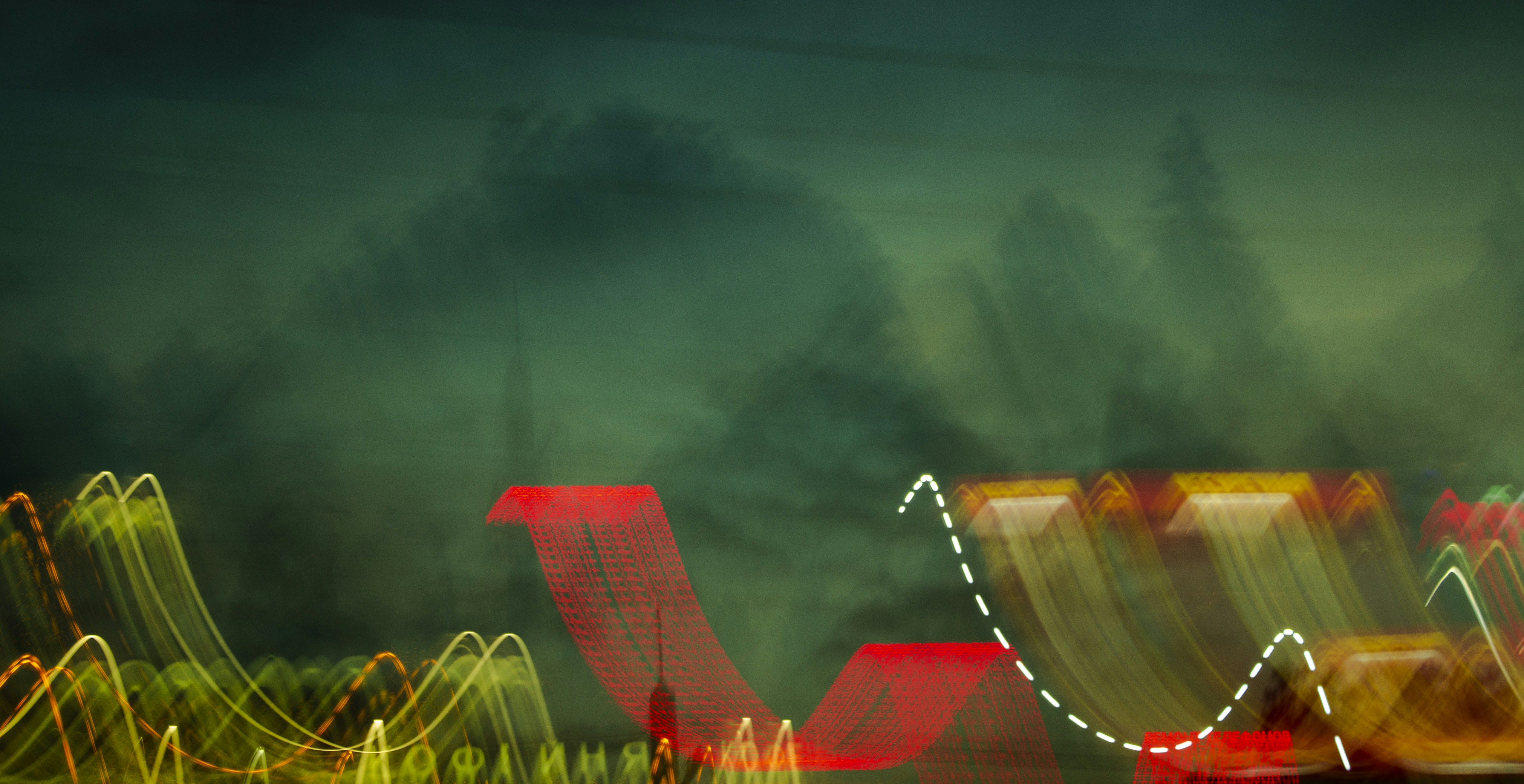 red and yellow building under blue sky