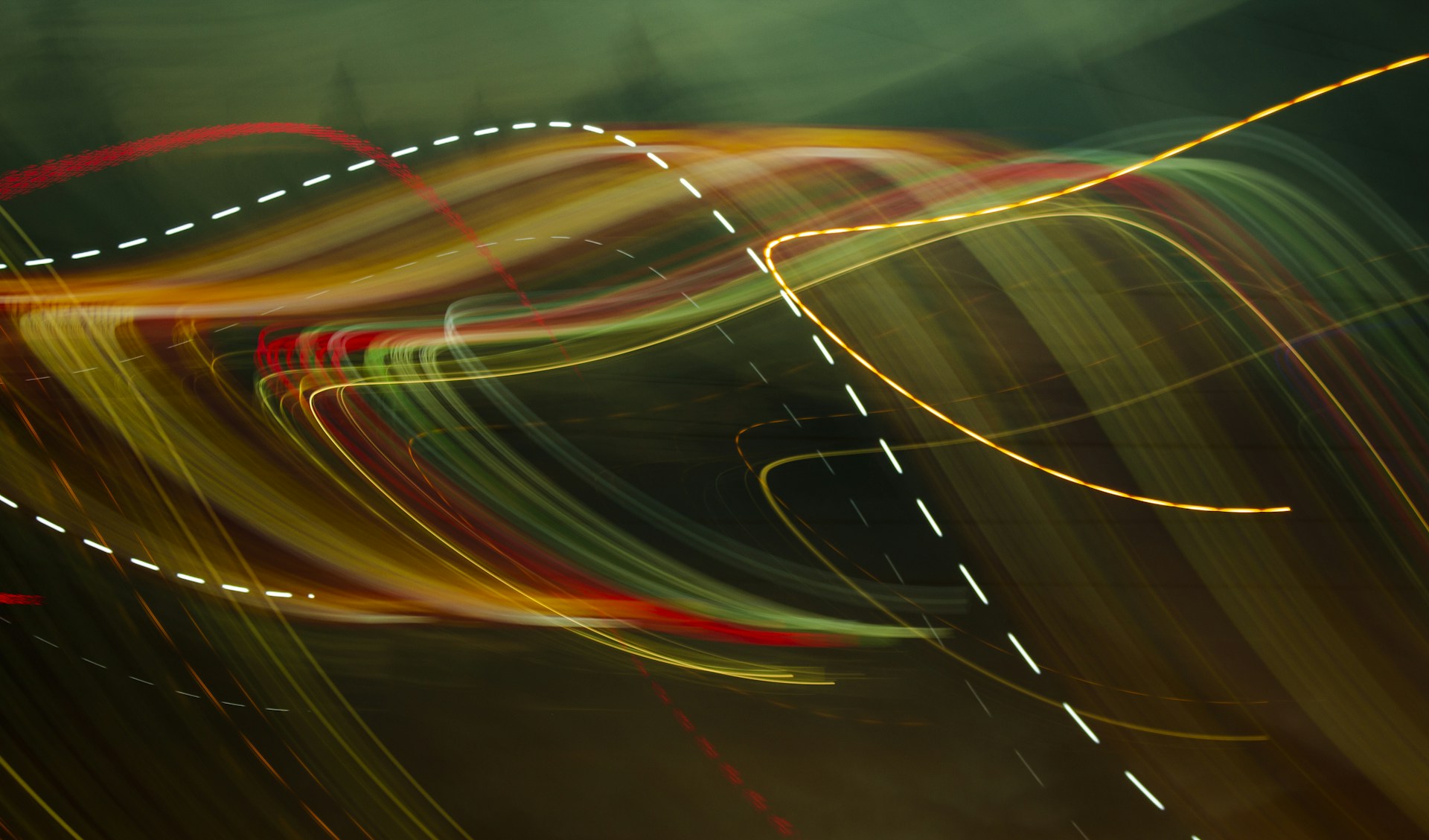 time lapse photography of cars on road during night time