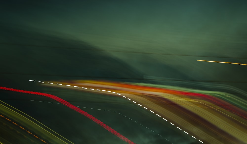 time lapse photography of cars on road during night time