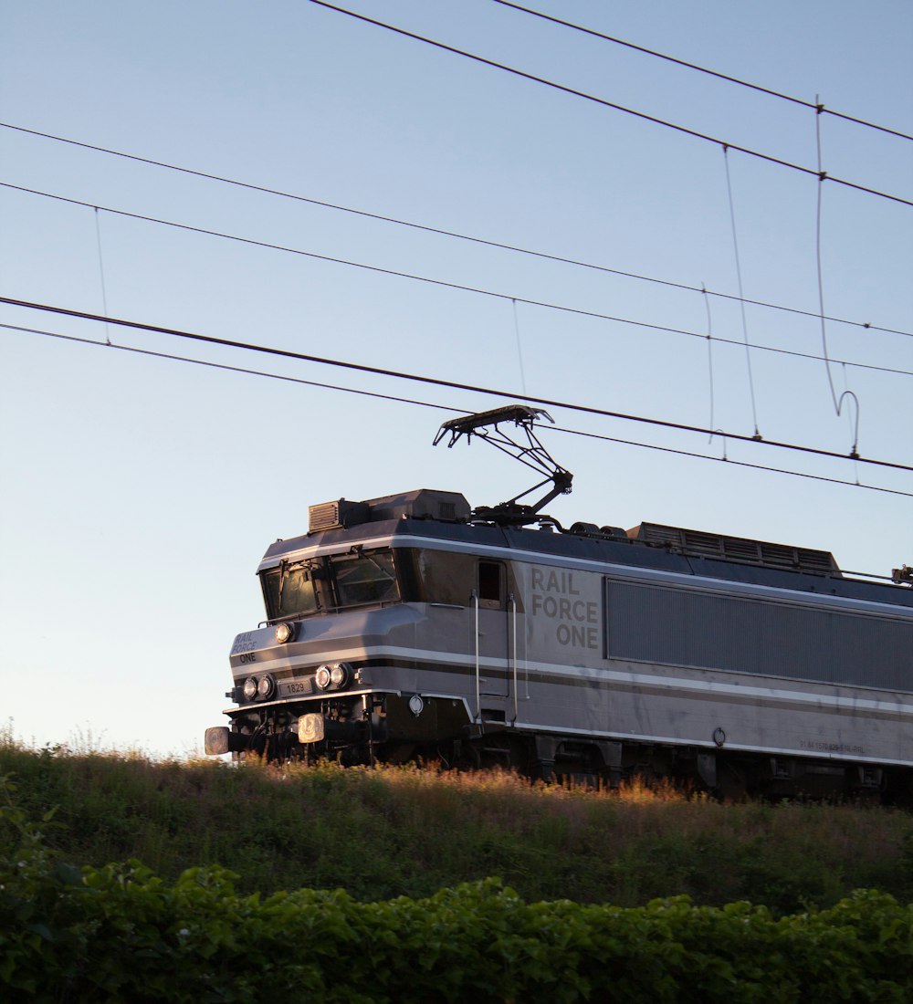 black and white train on rail road