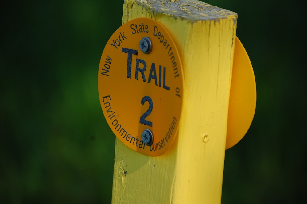 yellow and blue wooden signage