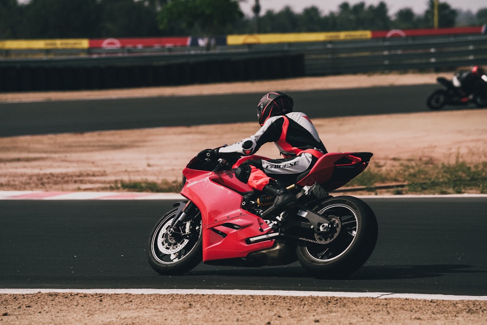 red and black sports bike