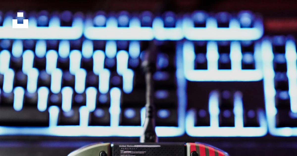Ide Controller Red Red and black game controller photo – Free Video gaming Image on Unsplash