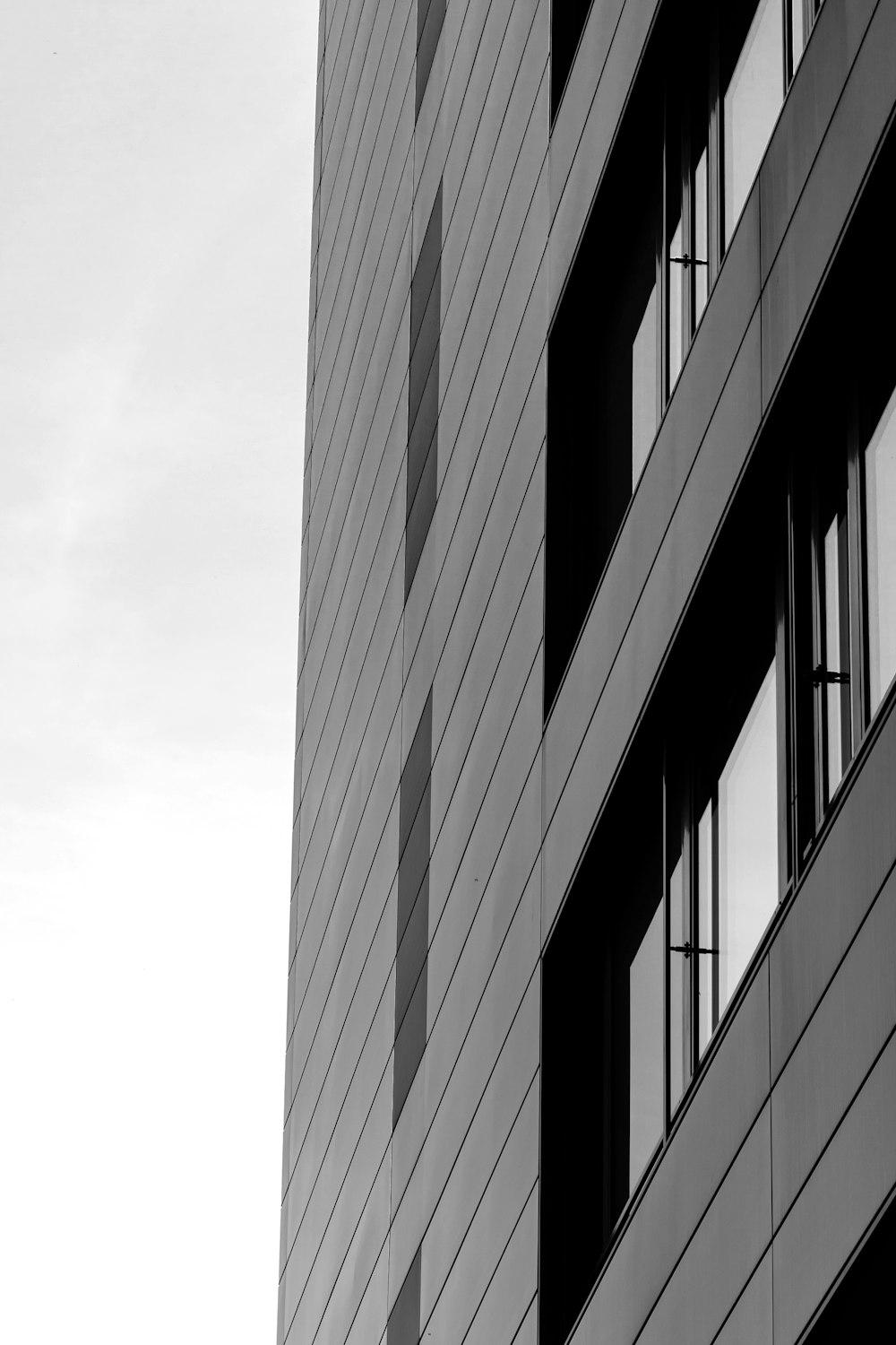 grayscale photo of high rise building