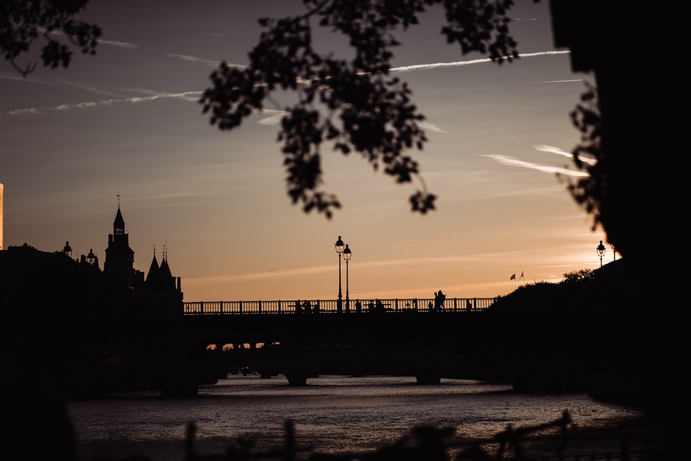 silhouette of building during sunset