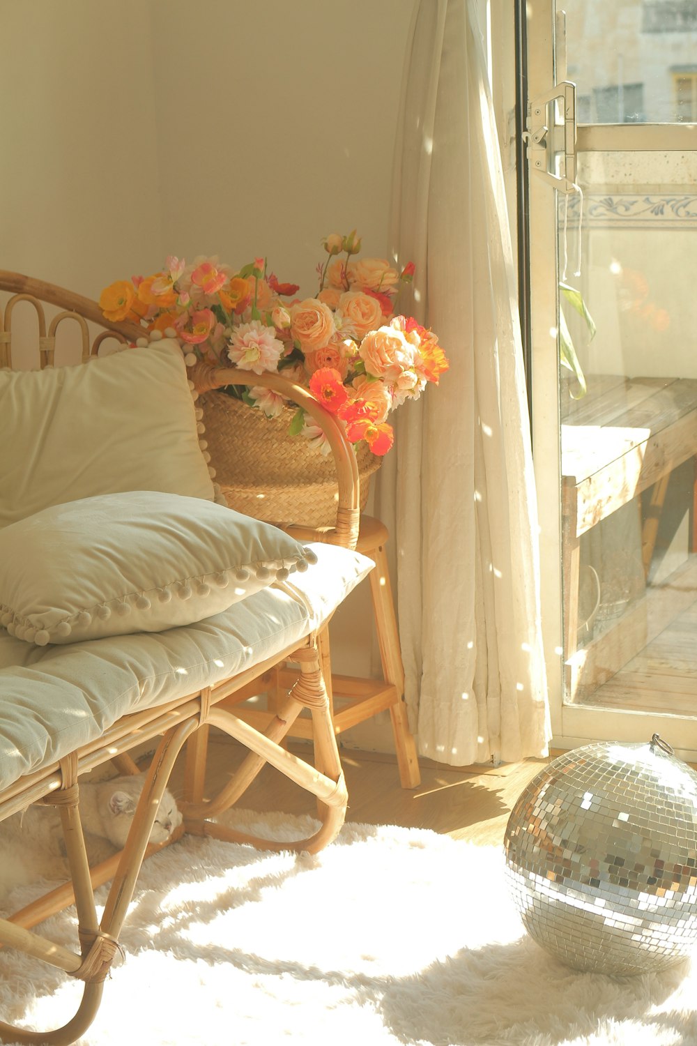 white pillow on white and brown wooden chair