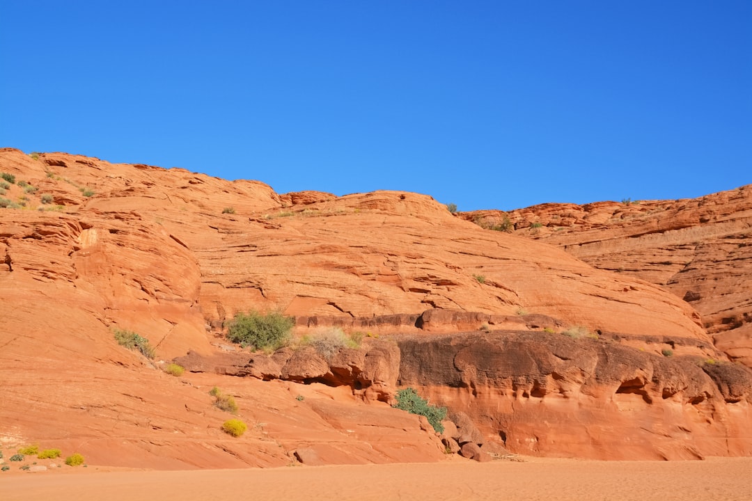 brown rock formation under blue sky during daytime