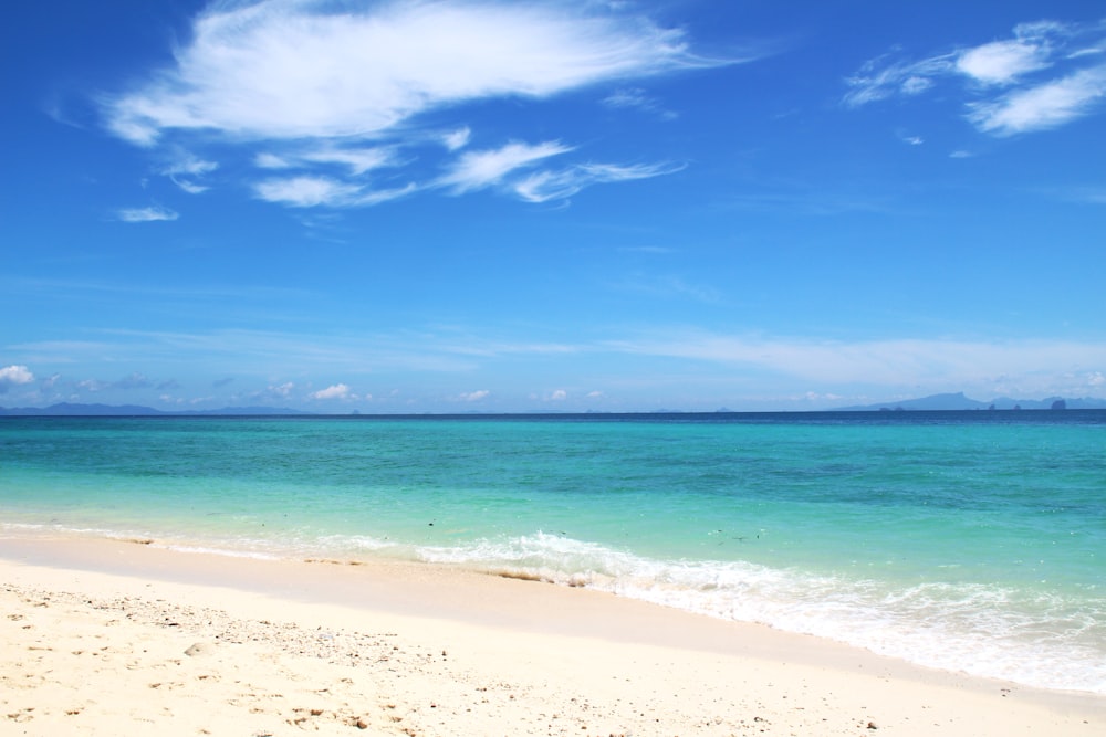 blue sea under blue sky during daytime