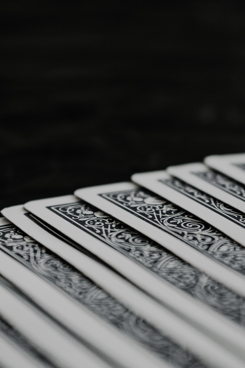 stack of books on black surface