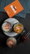 stainless steel fork beside round gray ceramic plate