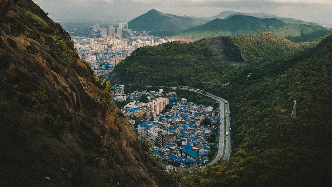aerial view of city buildings on mountain during daytime