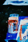 orange and white plastic bucket
