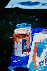 orange and white plastic bucket