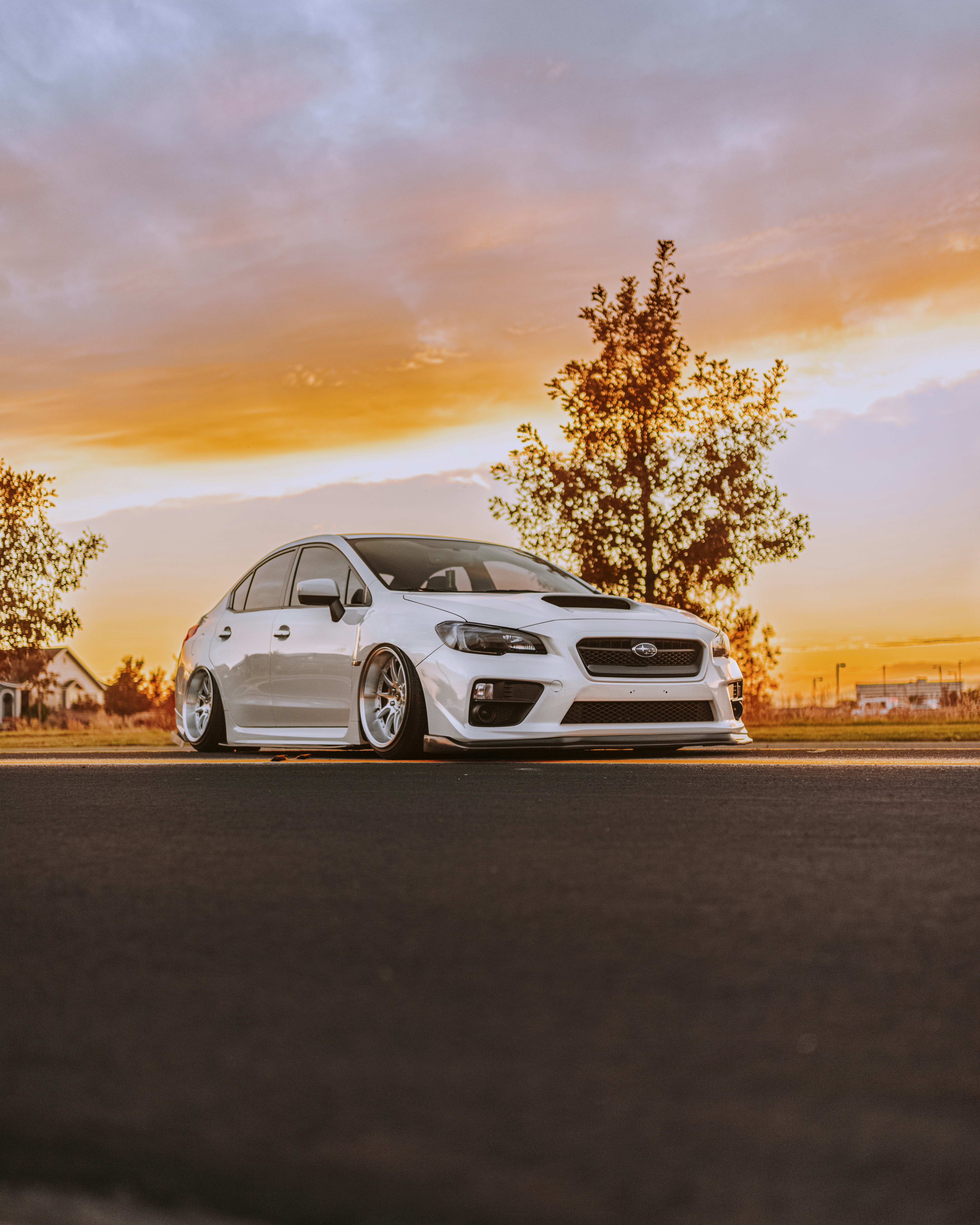 white bmw m 3 on road during sunset