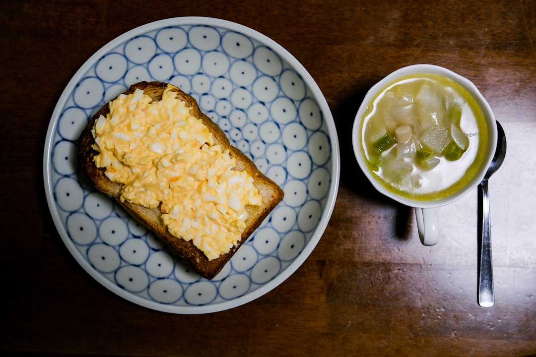 bread on white and blue ceramic plate,